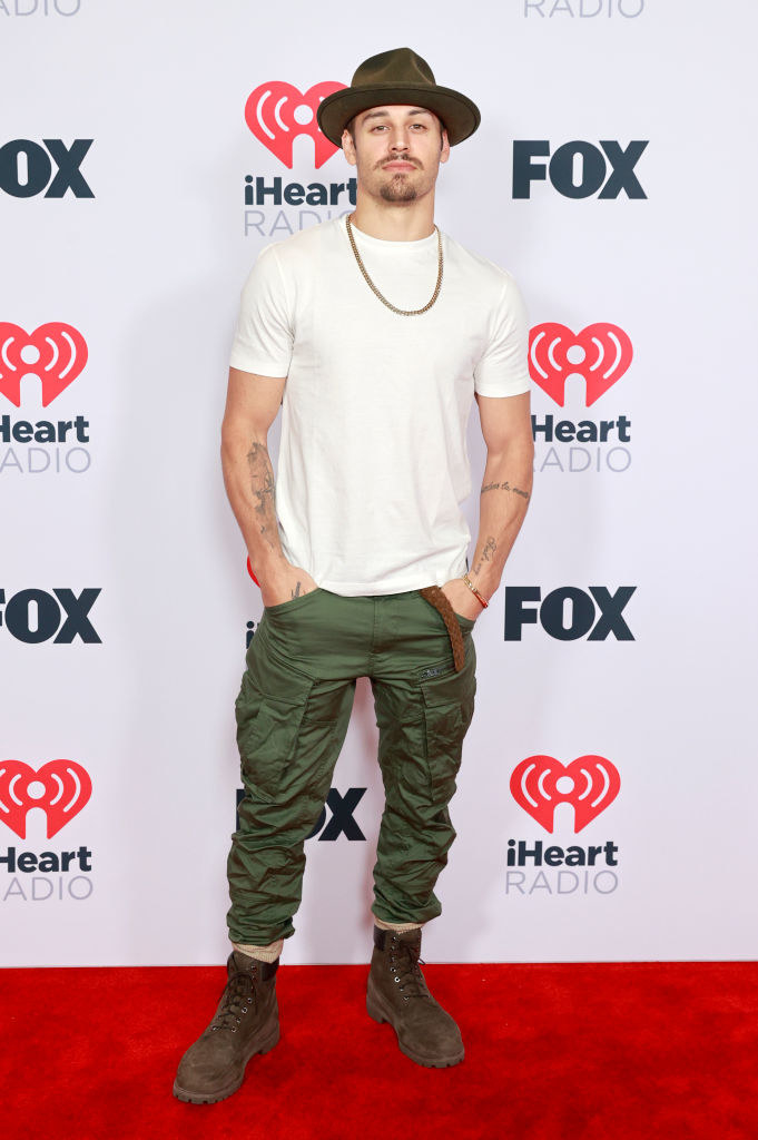 Ryan Guzman rocking the 2021 iHeartRadio Music Awards in a tee and utility pants
