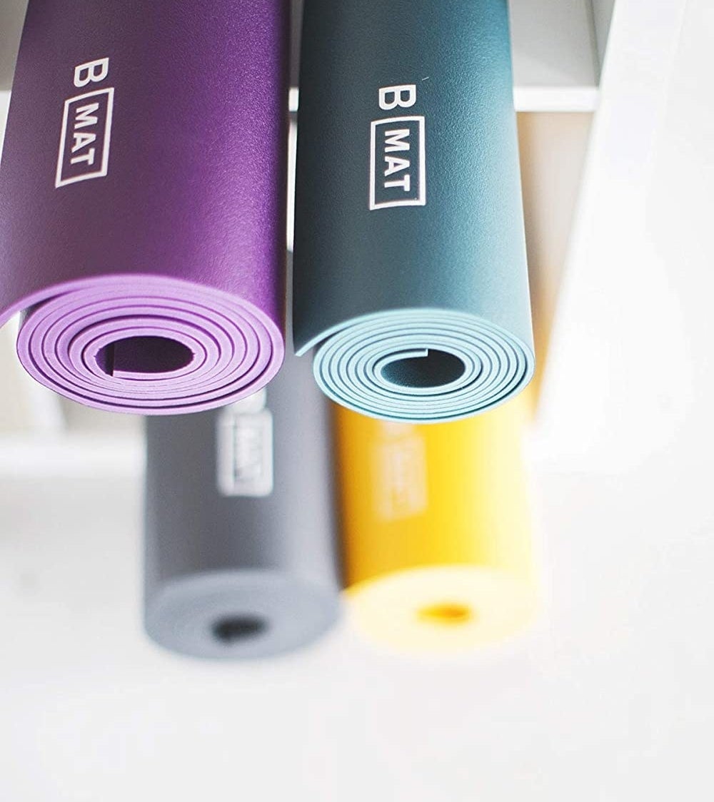 Two rolled up yoga mats 