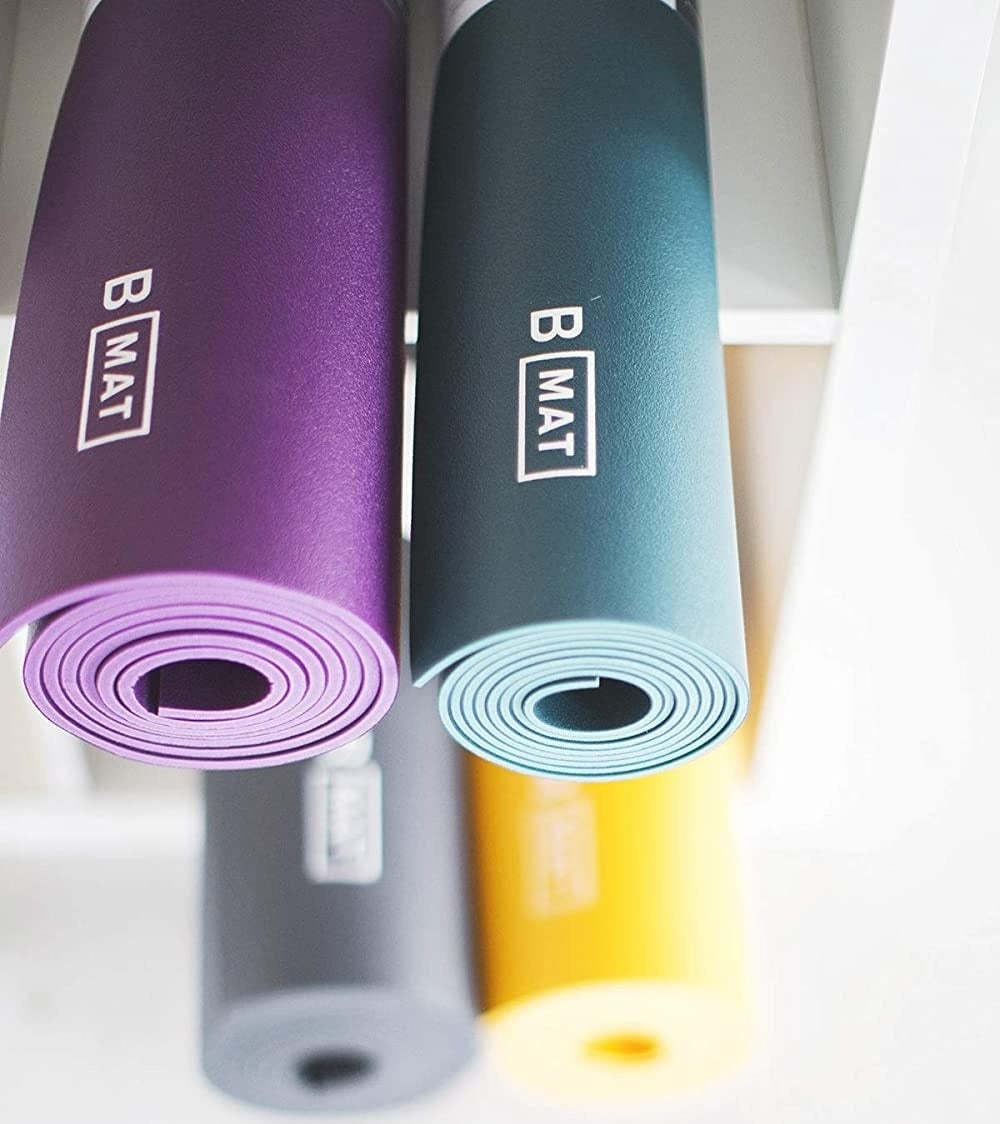 Two rolled up yoga mats