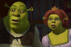 Shrek and Princess Fiona, in her orge form, open the door to their home with confused expressions on their faces.