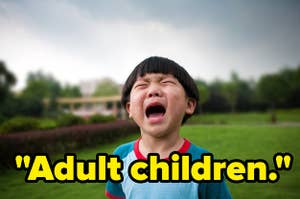 A young boy outside in a yard with eyes shut and mouth open crying, tears on his cheeks, in front of text Adult children