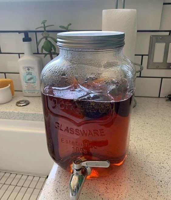 Reviewer&#x27;s picture of the large mason jar-like dispenser 