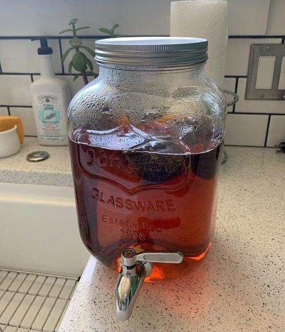 Reviewer&#x27;s picture of the large mason jar-like dispenser 