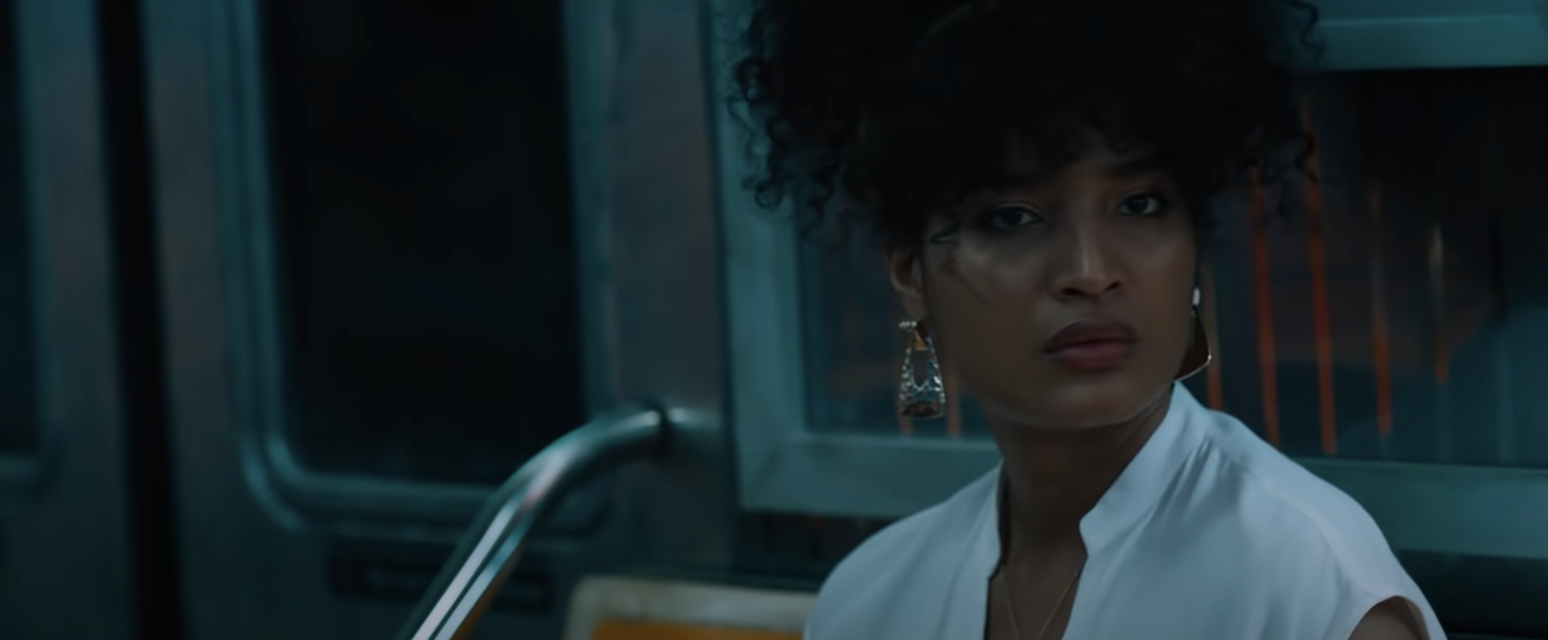 Indya Moore riding the subway in escape room