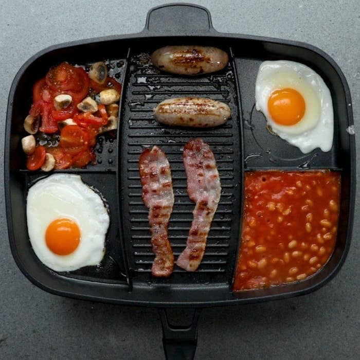The skillets with breakfast ingredients inside
