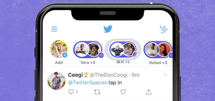 The Twitter app on the phone shows little colored bubbles denoting people in conversation with each other