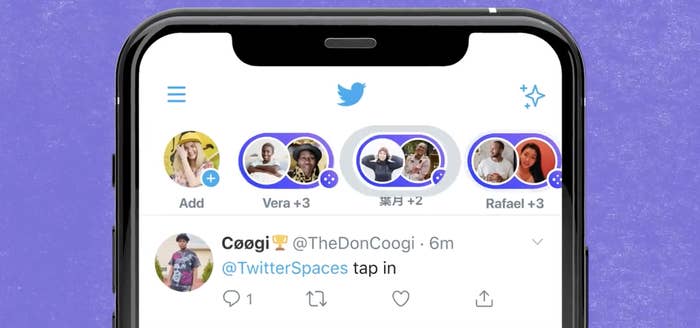 The Twitter app on the phone shows little colored bubbles denoting people in conversation with each other