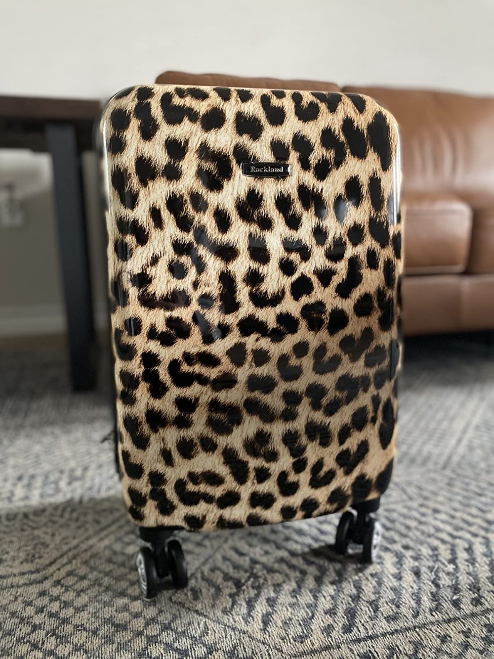 The suitcase in the color Leopard