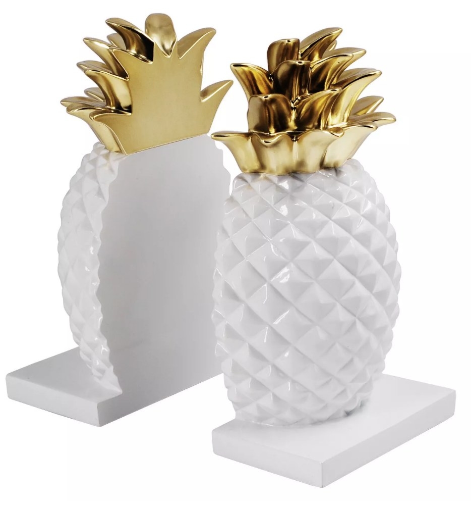 White and gold, pineapple-shaped bookends 