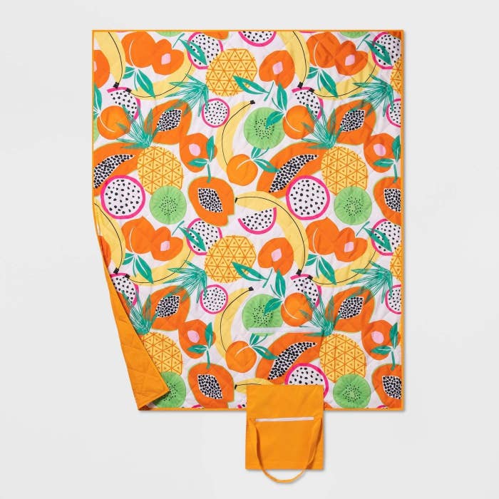 orange, yellow and green fruity picnic blanket