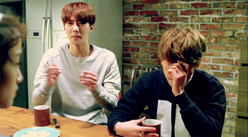 Sehun cheers excitedly while Baekhyun looks upset in the k-drama EXO Next Door