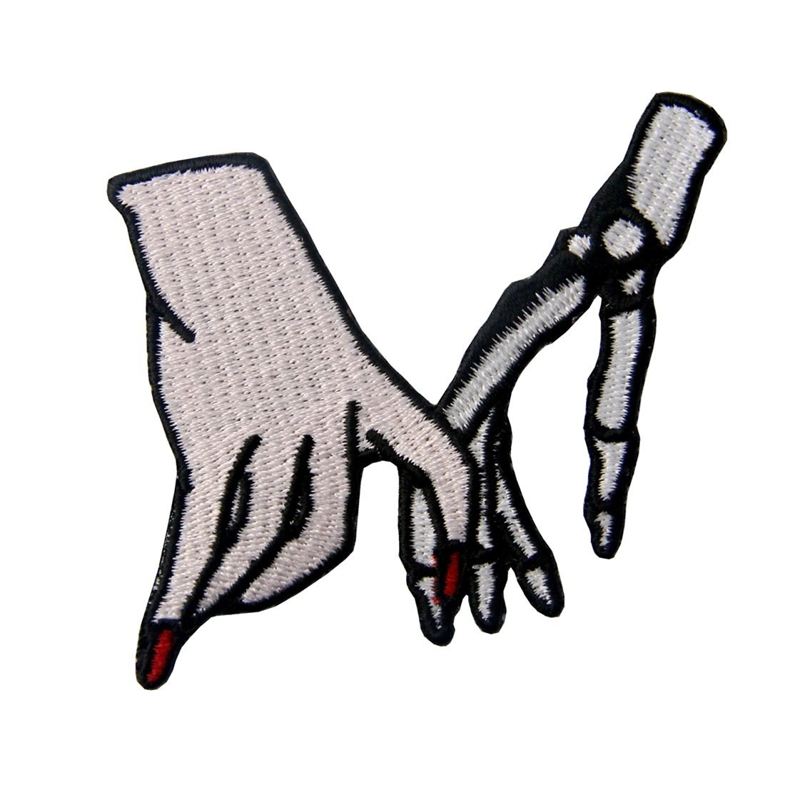 A patch with a cartoon-like human hand wearing red nail polish and a in a skeleton hand holding pinkies.