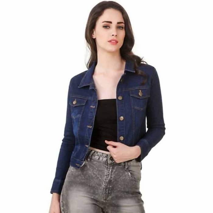 Model in a dark blue denim jacket