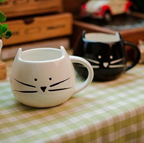 Black and white cat head shaped ceramic coffee cups
