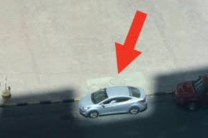 photo of a car against the shadow of the street