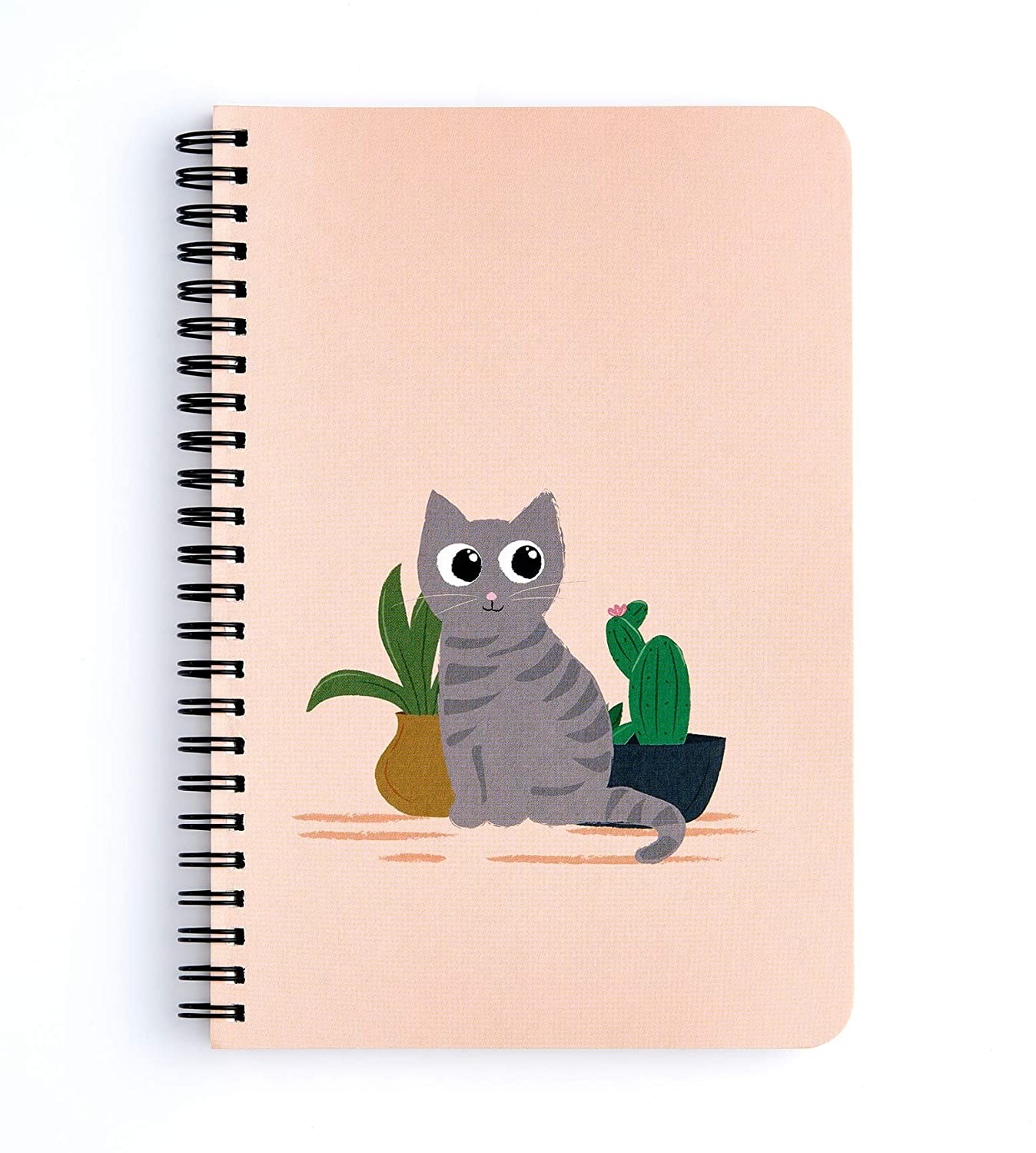 Pink dotted page journal with a cat and houseplants on the cover