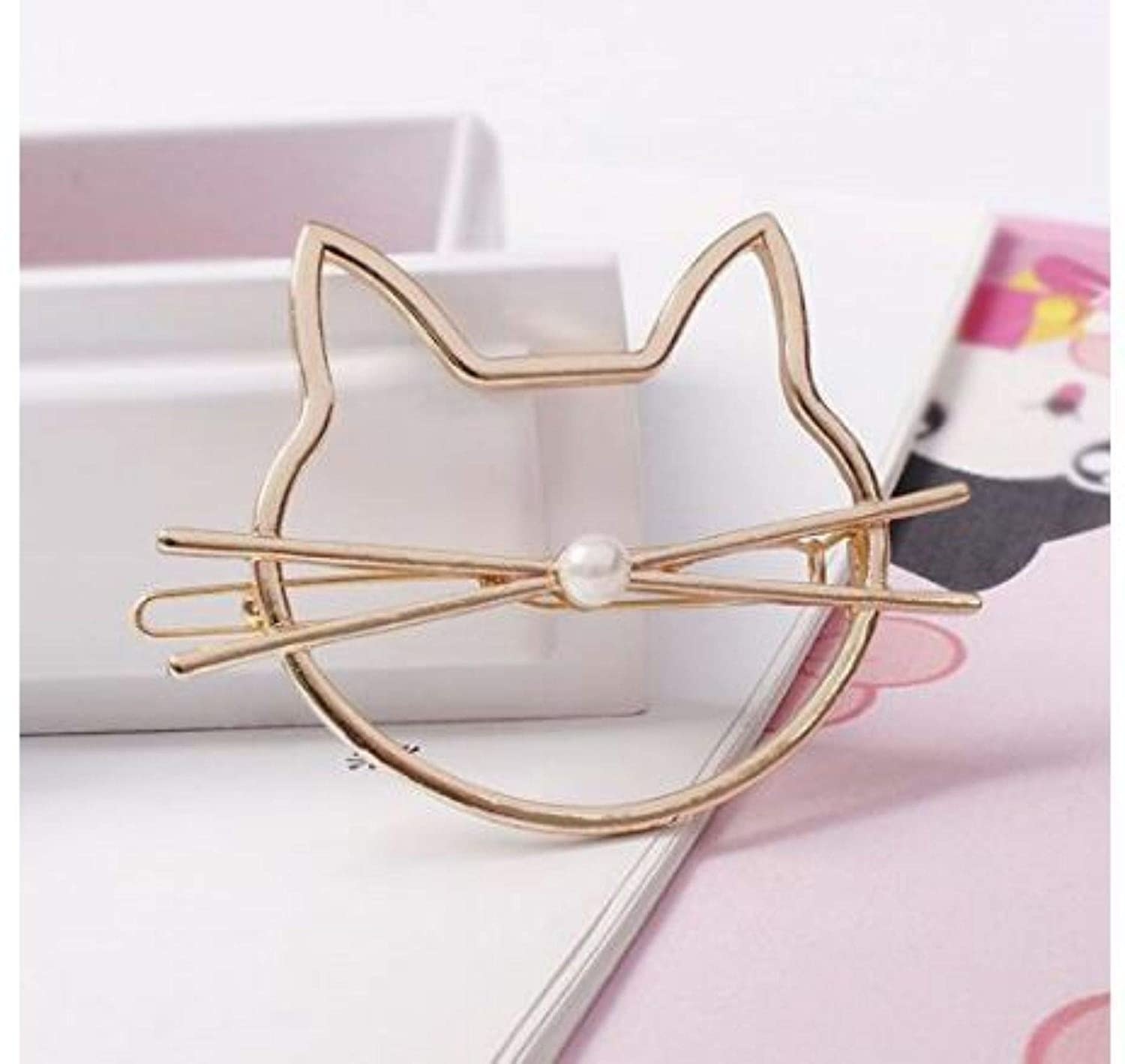 Gold-plated cat hair pin with pearl nose and whiskers