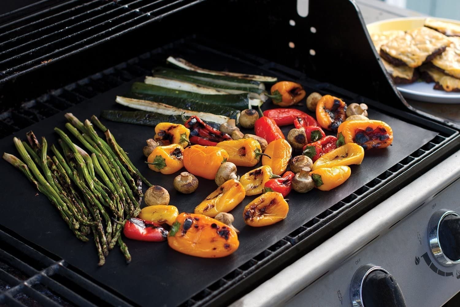 veggies on the mat on the grill