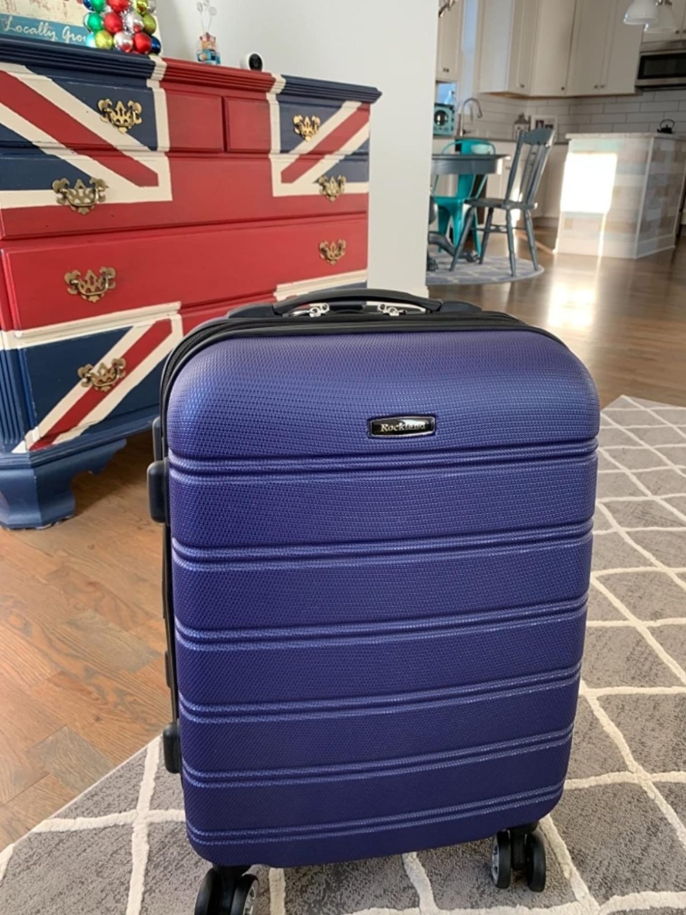 The suitcase in the color Blue