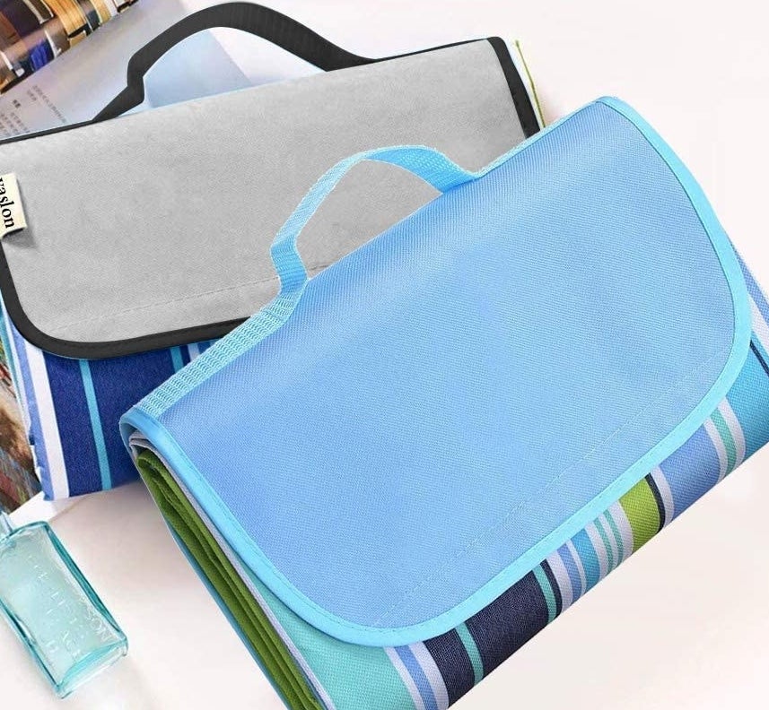 the picnic blanket folded up into a little briefcase 