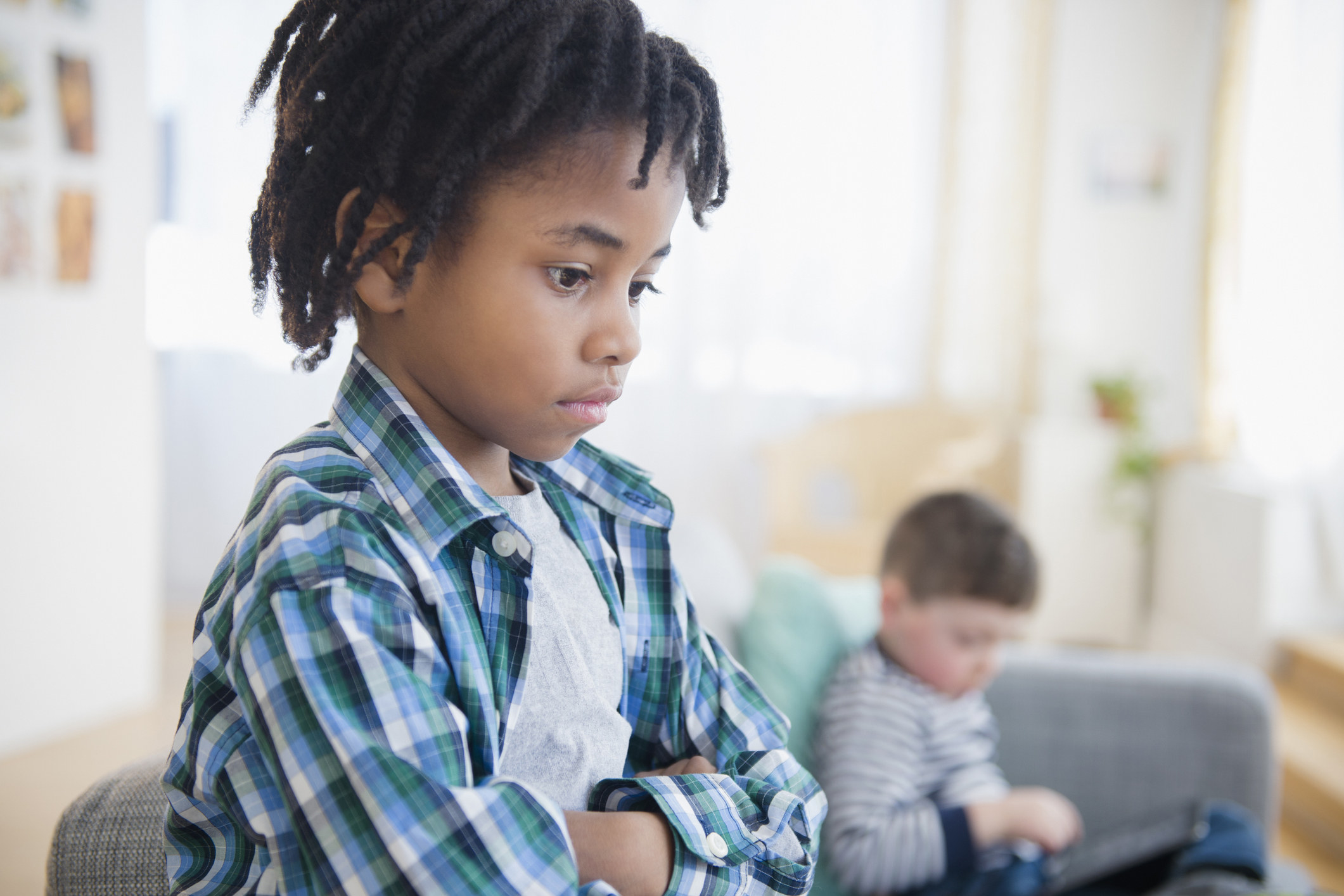 Getty image of a kid looking upset