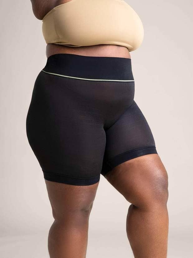 a person wearing the sheertex shorts 