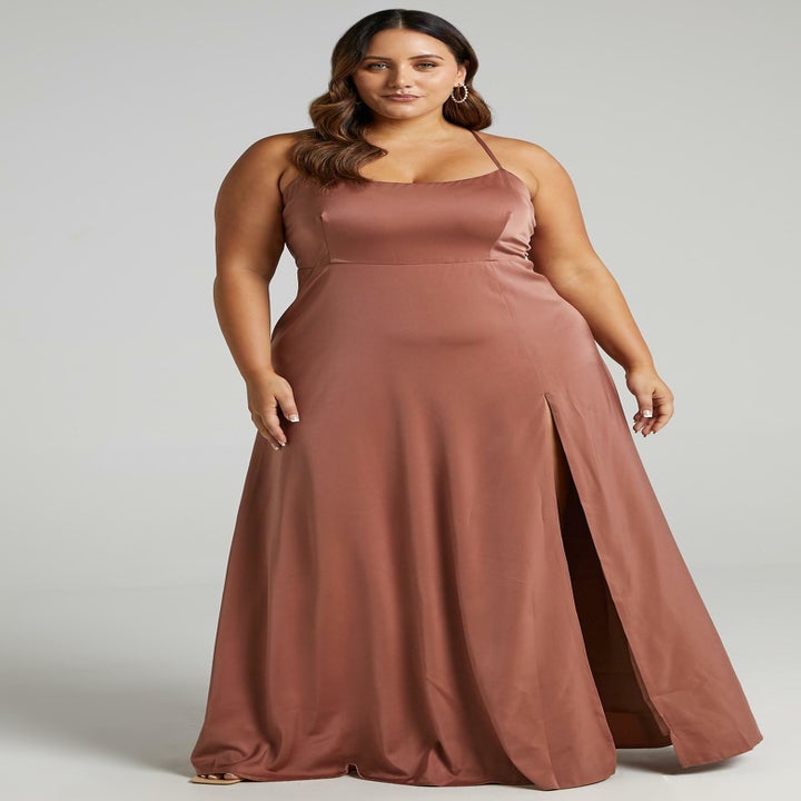 model wearing a satin blush gown 