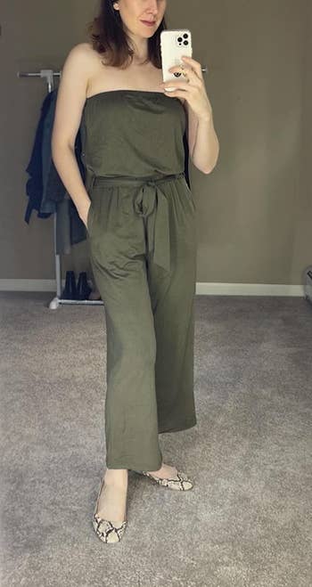 front view of a different reviewer wearing the jumpsuit in army green