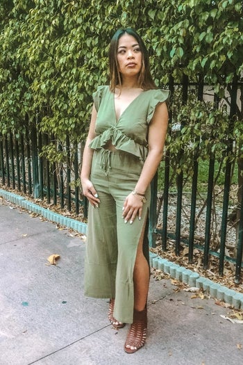 front view of a different reviewer wearing the set in green