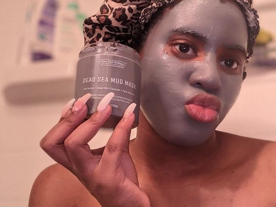 Reviewer wearing the mud mask for a facial