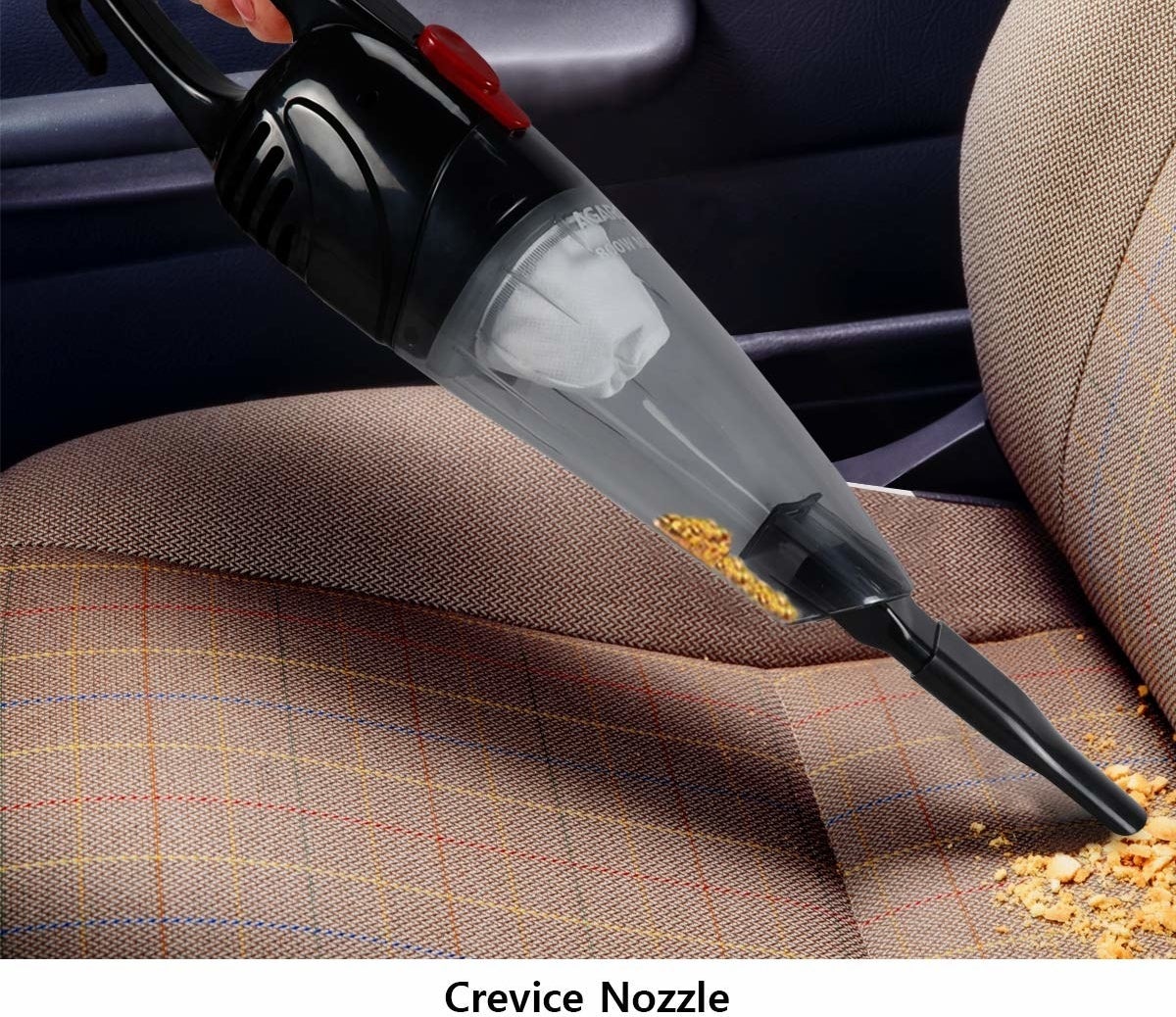 The handheld vacuum cleaner used to clean up crumbs from a car seat.