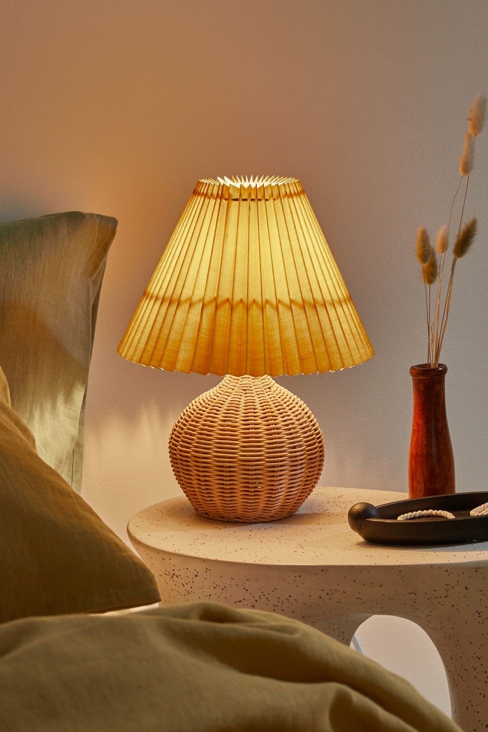the marnie table lamp sits on a nightstand