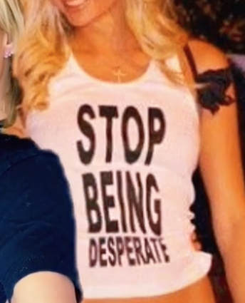 Close up of Paris Hilton's "Stop Being Desperate" tank top