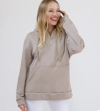 Model in the beige version with the hood down 