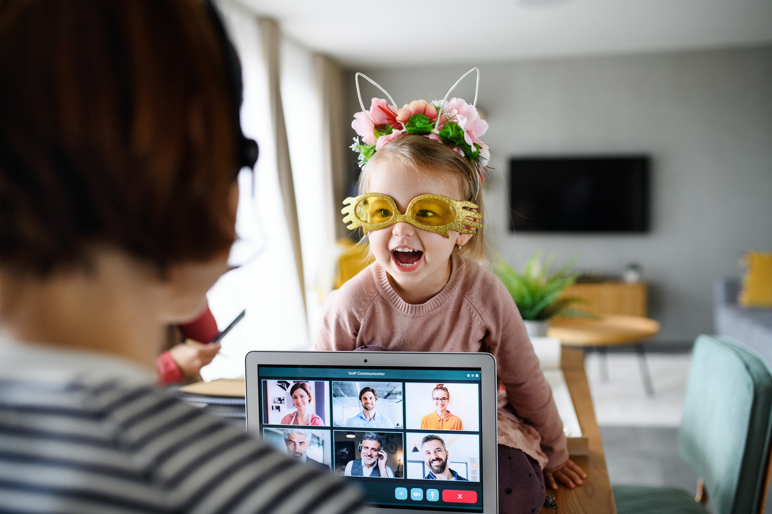 Photo of a toddler distracting her mother