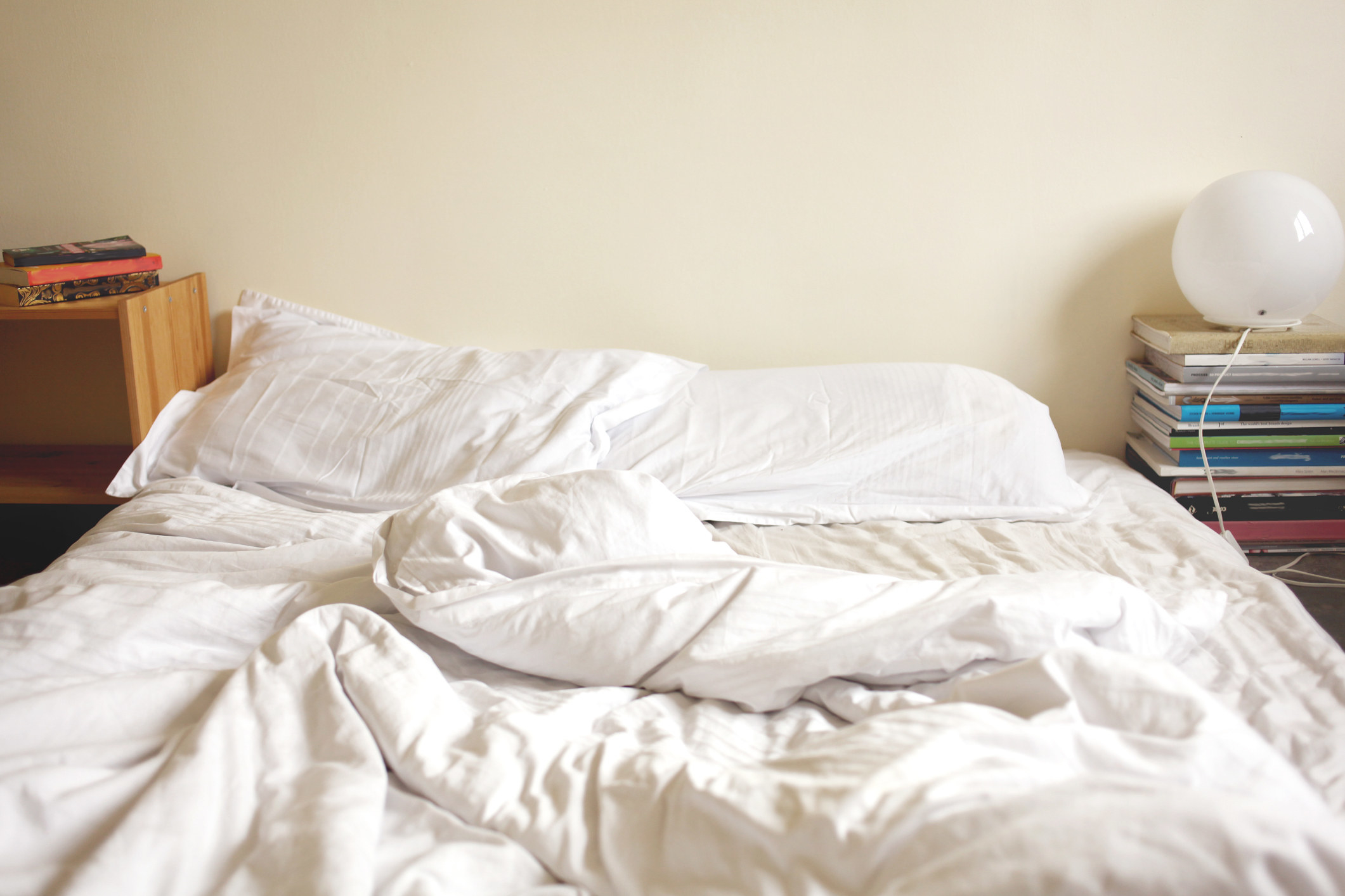 Messy bed covers.