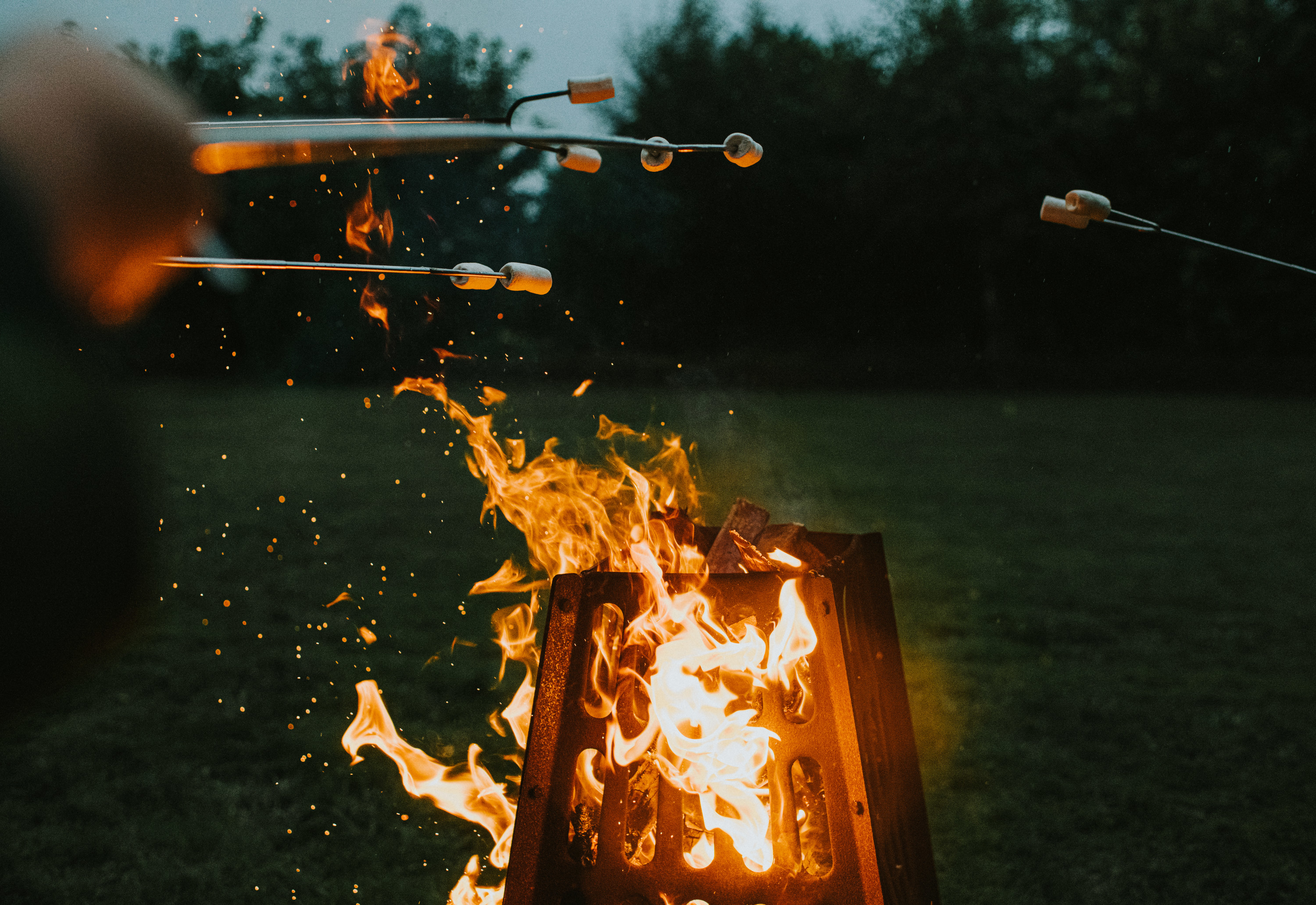 A fireplace and roasting marshmallows