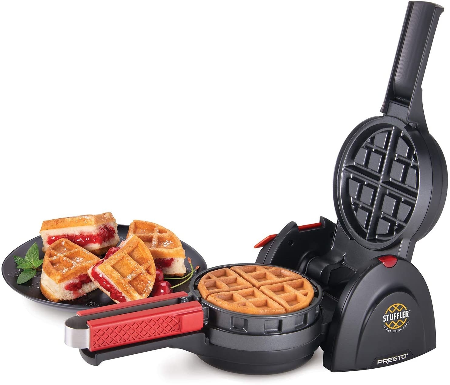 The waffle maker displaying a waffle and a plate with a sliced waffle