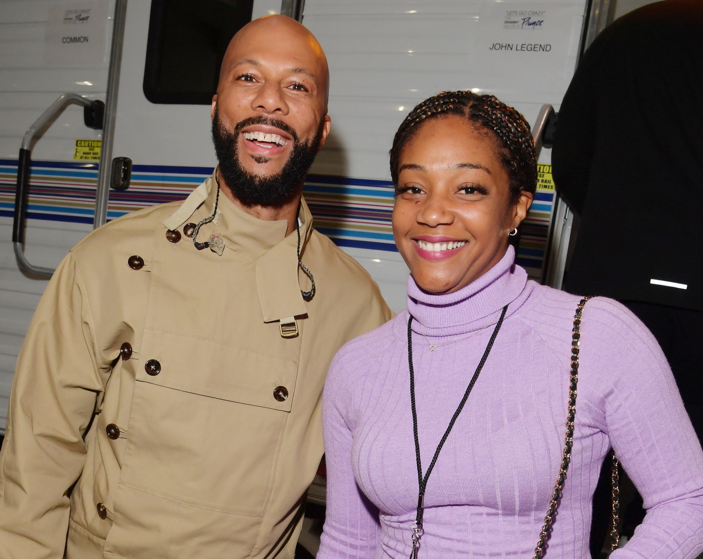 Tiffany poses next to Common