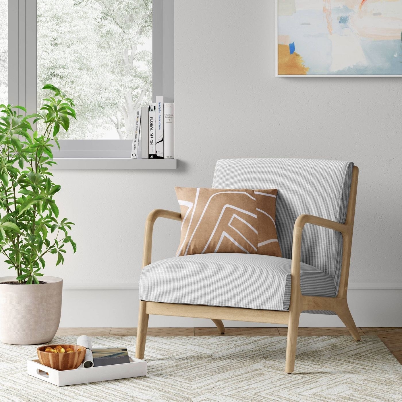 A wood accent chair next to a plant