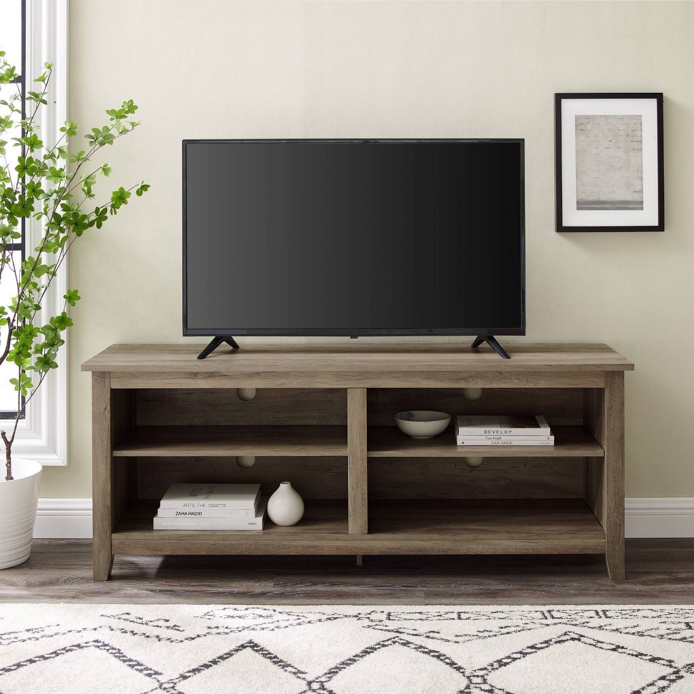 A rustic woof TV stand in a living room 