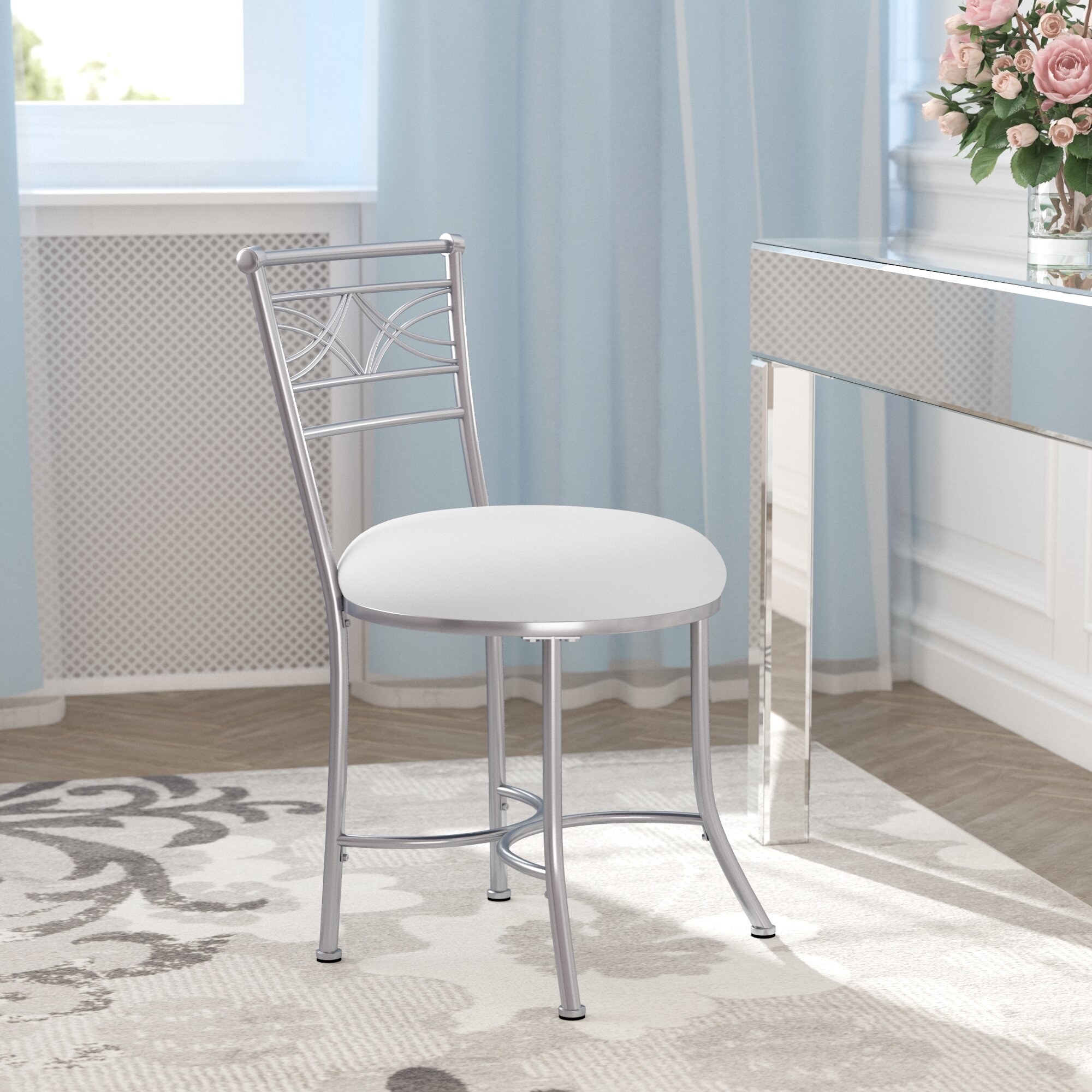 the silver stool with white cushion