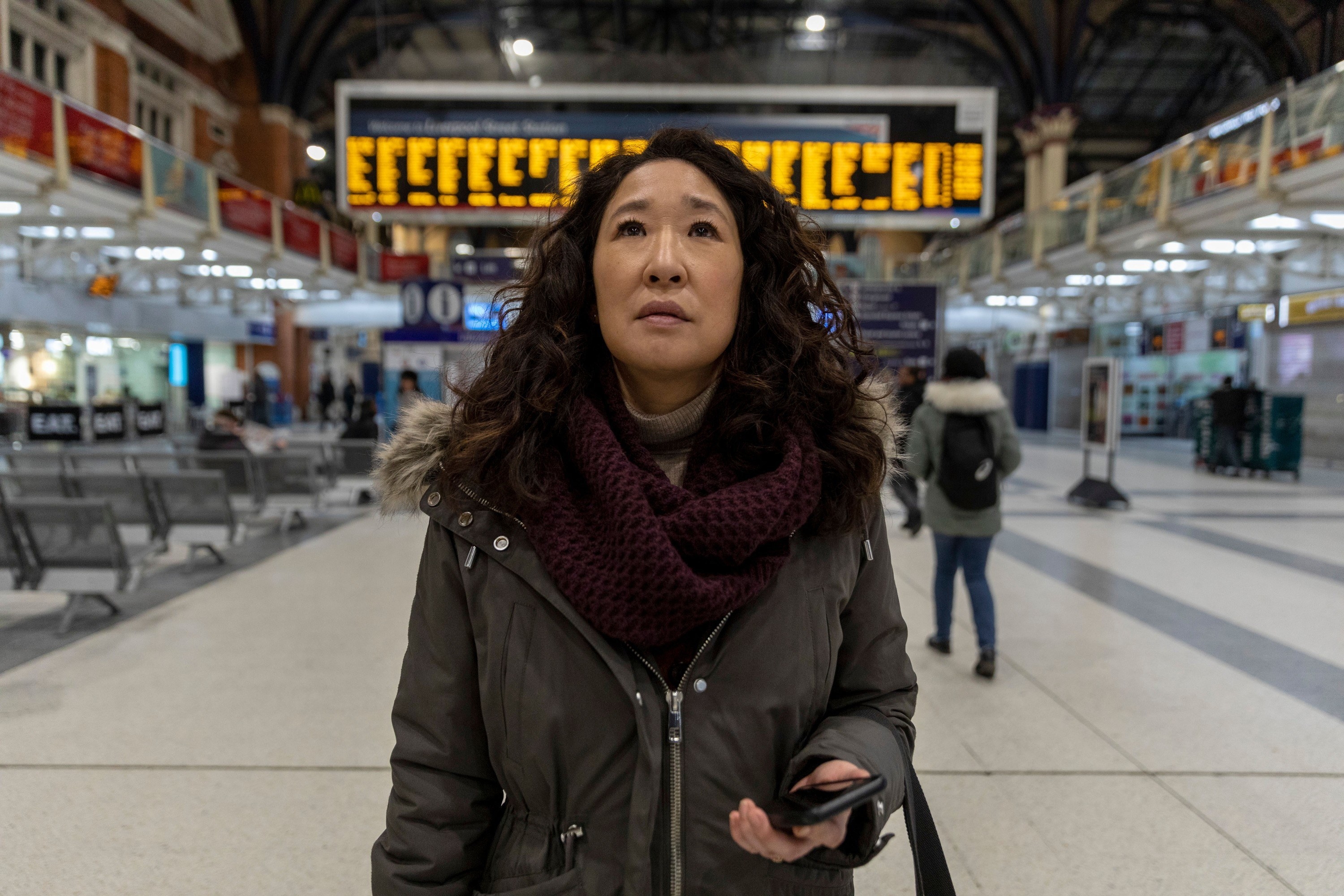 Sandra Oh in a train station