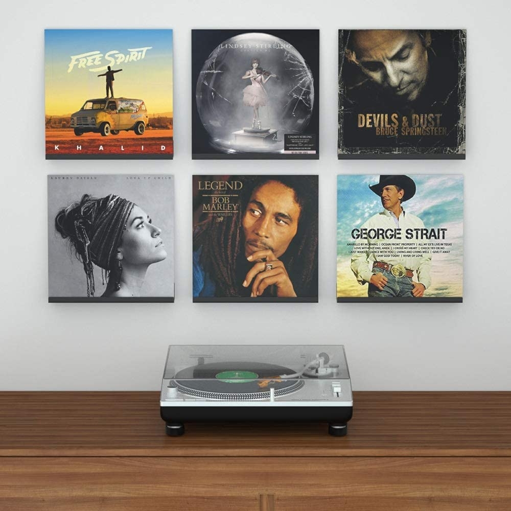 Six ultra-slim shelves with records on them