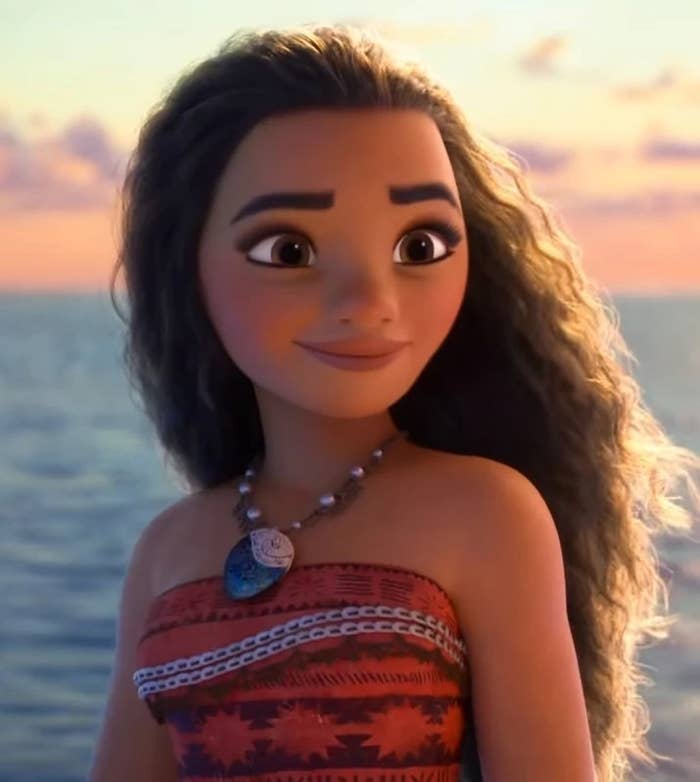 moana stands in front of the ocean