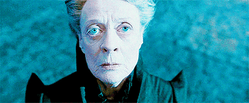 McGonagall looks ahead with a blank, sad stare on her face