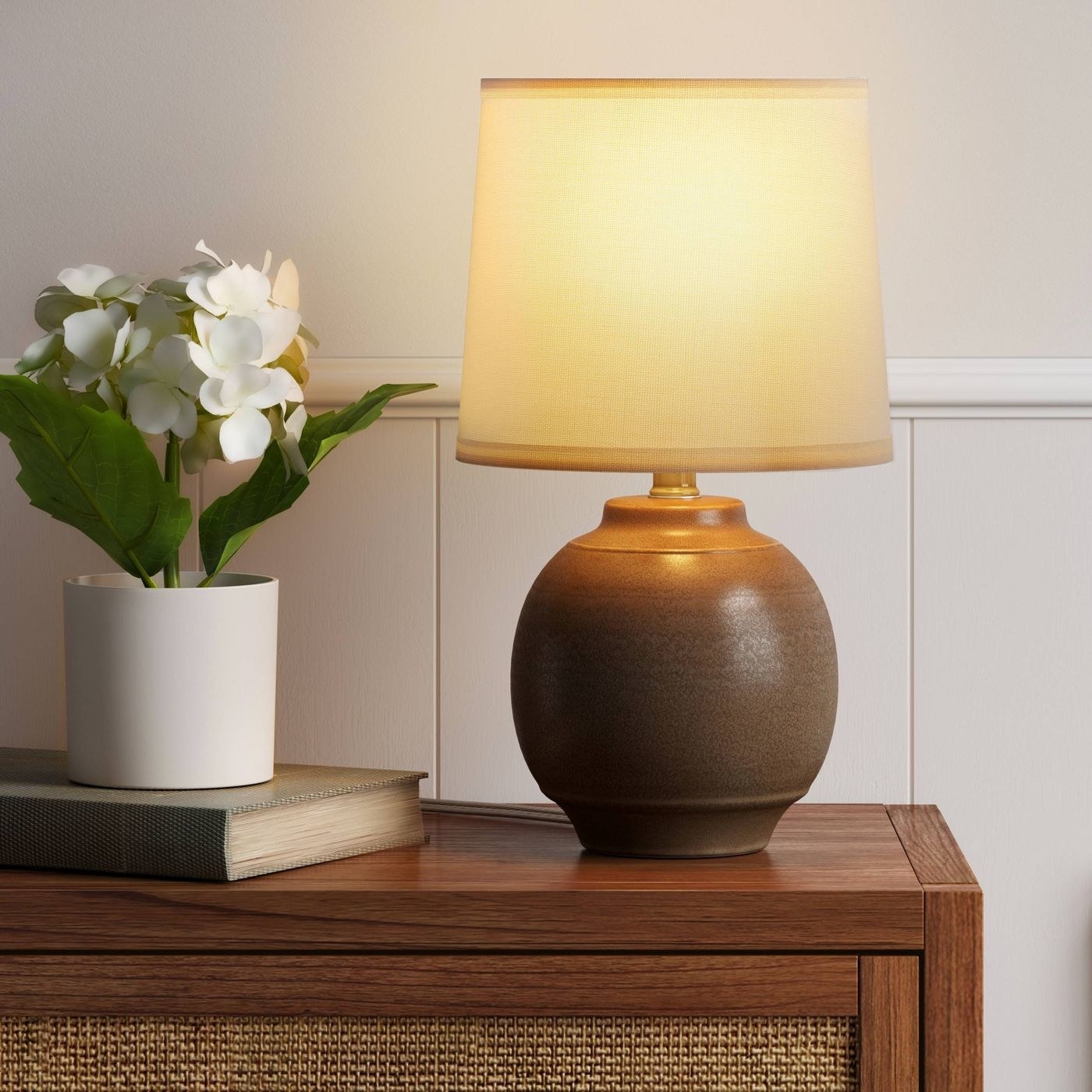 A brown lamp lit in a home