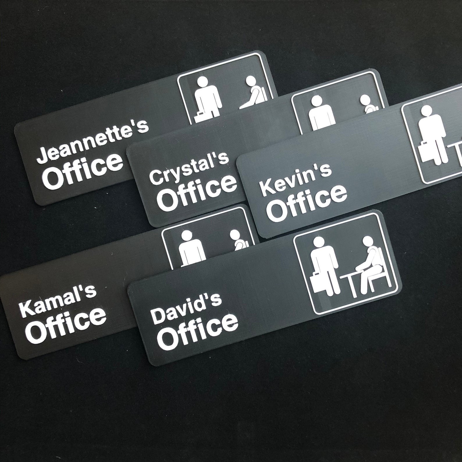 The Office door signs with people&#x27;s names on them like Kamal&#x27;s Office and Crystal&#x27;s Office 