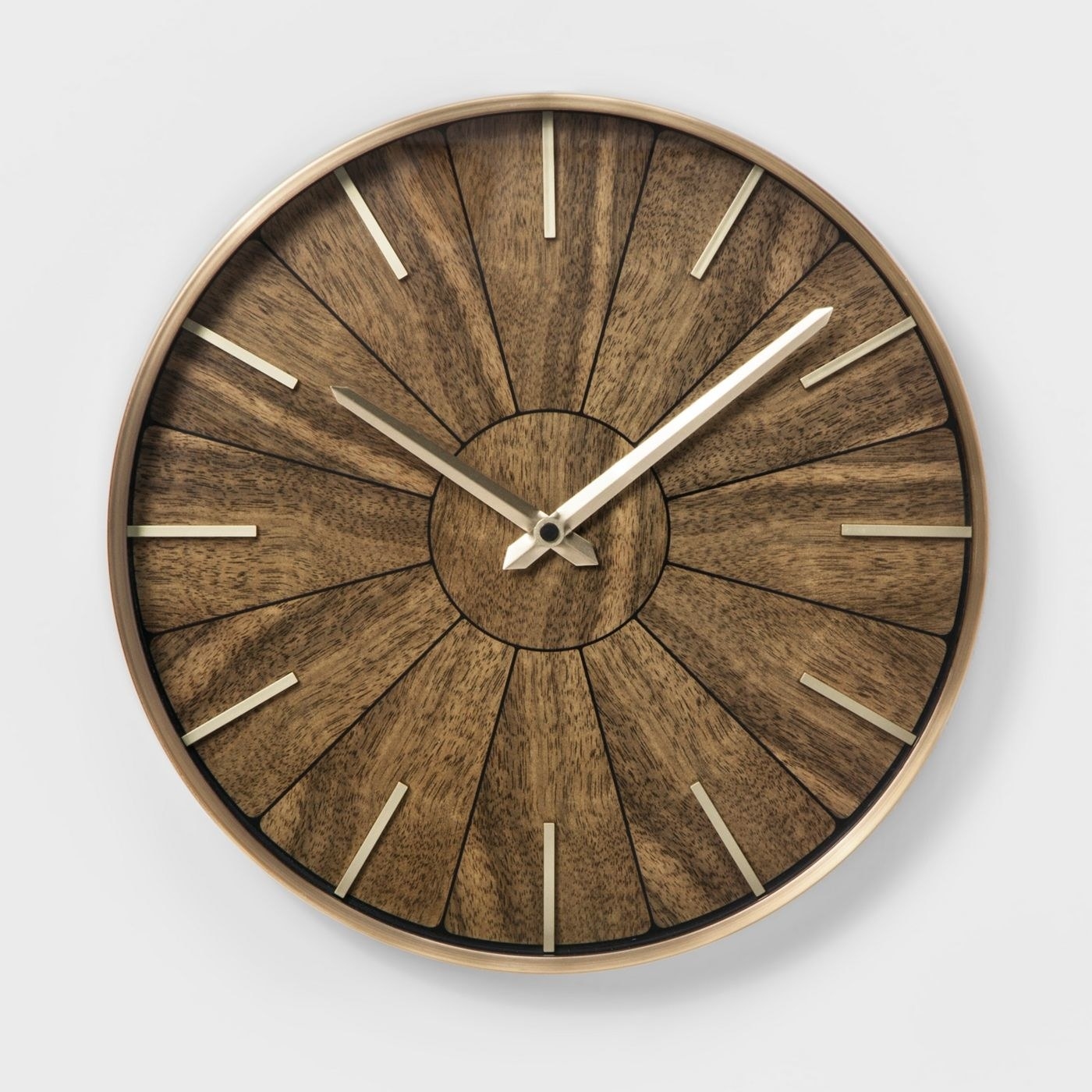A wooden clock on a wall