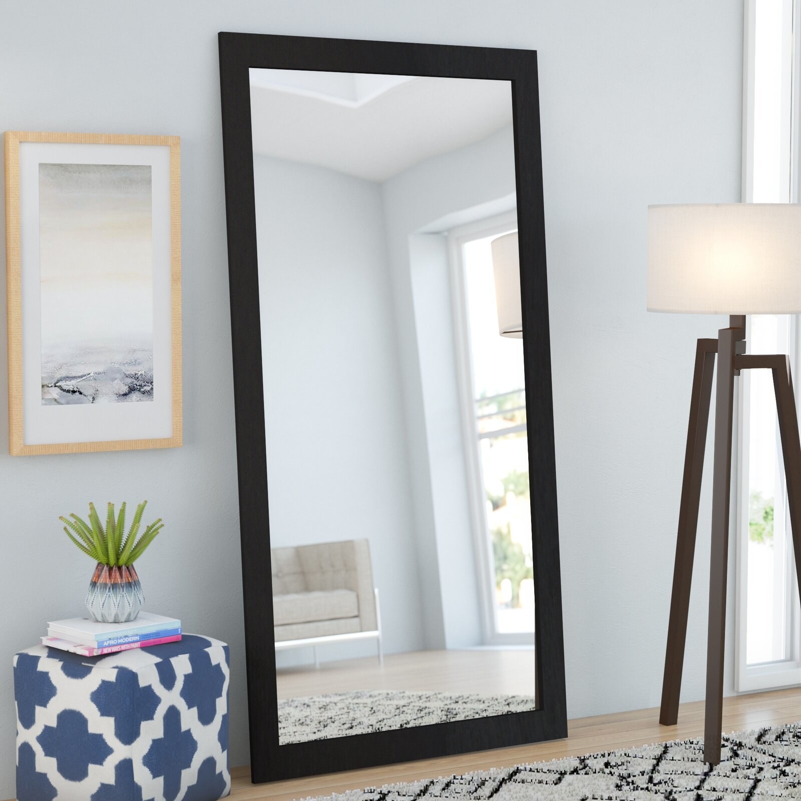 A modern, wooden full-length mirror that can lean against walls in bedrooms or guest rooms